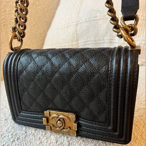 Gently loved authentic chanel small boy in aged gold caviar. W/ auth + dust bag.